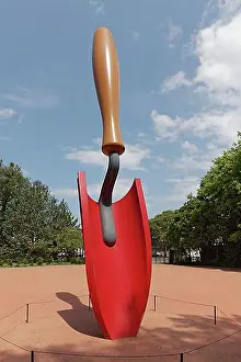 Exterior Photograph Prints: Oversized red planting shovel, sculpture Plantoir by sculptor Claes Oldenburg in Serralves Park