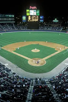 Stadium Prints: Overview of diamond and full bleachers during a night Baseball game