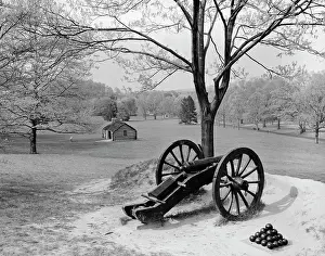 Guns Prints: Overview Of Landscape At Valley Forge With Cannon In Foreground & Cabin In Background