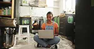 Maintenance Prints: Painting, laptop and woman in home for renovation