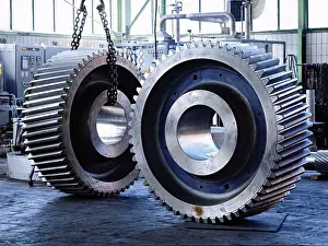 Manufacturing Prints: A pair of giant gear wheels in factory which produces gears