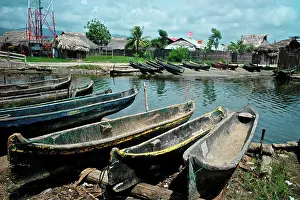 Kayak Prints: Panama, Kuna Yala, Coastal Indigenous guna village of Ustupu with flag of Revolution Guna