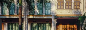 Palmtree Prints: Panorama of of old building in the old idstrict of Singapore with shutters on the windows