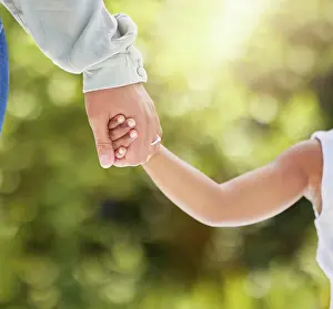 Holding Hands Prints: Parent, child and holding hands in outdoor closeup for walking park