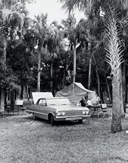 Tent Prints: Parents and their children camping