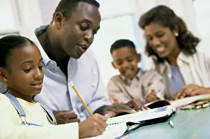 4 5 Years Prints: Parents helping their son and daughter with their homework