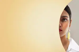 Aesthetic Prints: PARTIAL FACE SHOT OF A YOUNG WOMAN LOOKING AT CAMERA