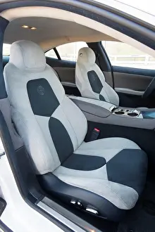 2012 Prints: Passenger's side view of the interior of a 2012 Fisker Karma showing the seats