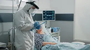 Lockdown Prints: Patient with coronavirus talking to doctor in protective suit