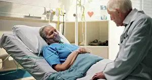 Patient, doctor and old woman with oxygen mask