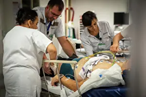 Electrode Prints: A patient who is not very lucid is placed under electrodes in intensive care to monitor his heart rate