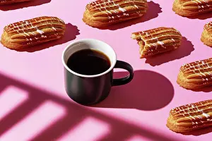 Mixed Prints: pattern of eclairs on a pink background