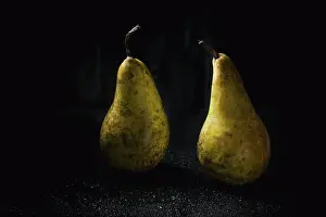 Back Ground Prints: Two pears over wet black background
