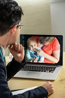 Tooth Prints: Pediatrician in remote consultation with mother and infant with skin irritation