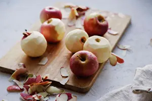 Home Prints: Peeling red apples for cooking an apple pie