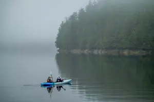 Kayak Prints: People kayaking at Cameron Cove in Barnard Harbor