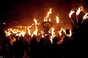 Large Group Prints: People marching along road for the East Hoathly Bonfire night; East Sussex, England