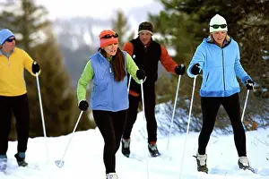 Agility Prints: Four people skiing