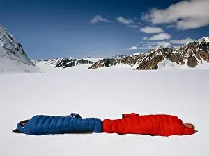 Glacier Prints: Two People Sleeping on Glacier