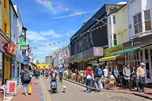 Cafe Prints: People walking along a sunny Gardner Street in the trendy North Laines district of Brighton
