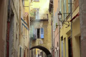 Balcony Prints: Person in an alley between houses, Villefranche-Sur-Mer, France