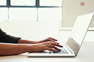 Newspaper Prints: Person, hands and copywriting with laptop in closeup for news blog