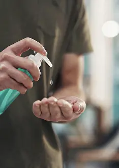 Personal Prints: Person, hands and sanitizer with drop for hygiene