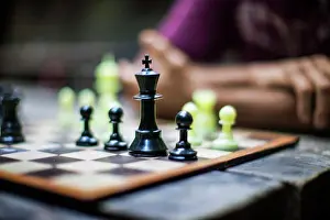 30 To 35 Years Prints: Person playing game of chess