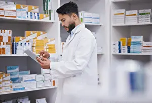 Typing Prints: Pharmacy, man or pharmacist with tablet for research or checking medical prescription on shelf