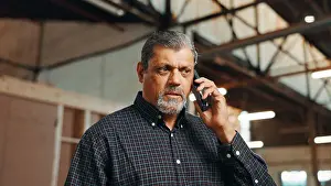 Builder Prints: Phone call, carpenter and man in workshop