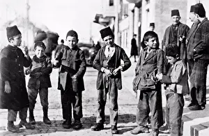 Turkey Prints: Photograph of children of different ethnic groups in a street, Ottoman Turkey. Dated 1914