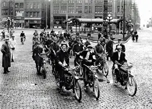 Gang Prints: Photograph of a motorcycle gang sitting on their bikes in Seattle. Dated 1914