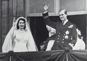 Balcony Prints: Photograph of Queen Elizabeth II and the Duke of Edinburgh waving from the balcony on their wedding day