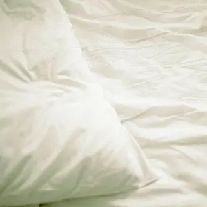 Soft Prints: A pillow on a bed