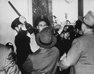 Activist Prints: Police Officer Blocks Clubbing -- Oakland police officer grass club of special officer