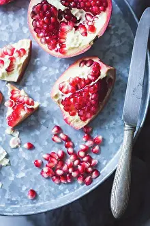 Knife Prints: Pomegranate and seeds on a tray