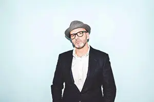 Casual Attire Prints: Portrait of attractive man in hat and glasses