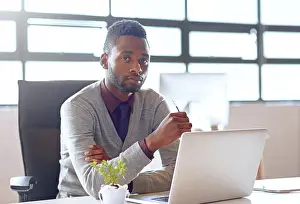 Search Prints: Portrait, black man and technology on desk in office for creative job as web developer or graphic designer for company