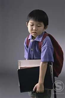 Sleeved Prints: Portrait of a boy carrying book and a backpack