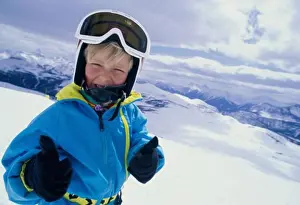 One Child Only Prints: Portrait of a boy showing a thumbs up sign, Banff National Park, Alberta, Canada