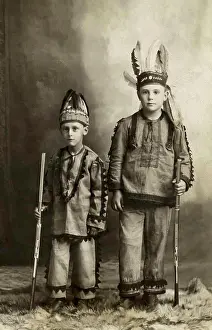 6 7 Years Prints: Portrait of two boys holding rifles, c. 1912