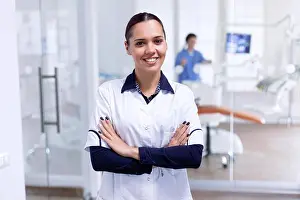 Personal Prints: Portrait of cheerful dentist in dental reception