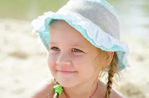 Freude Prints: Portrait of a cheerful little girl on the beach in panama Close-up portrait of a happy girl Europeans in panama
