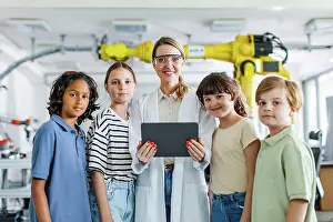Institution Prints: Portrait of children learning robotics in Elementary school