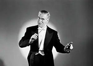 Arts Culture And Entertainment Prints: Portrait of conductor on stage