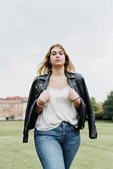 Voluptuous Prints: Portrait of confident young woman in park