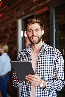 Press Prints: Portrait, creative and business man with tablet as journalist for news research in office