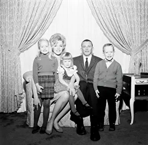 Smart Prints: Portrait of family with children in living room