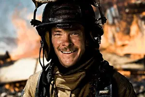 Model Release Prints: Portrait of a firefighter with fire in background