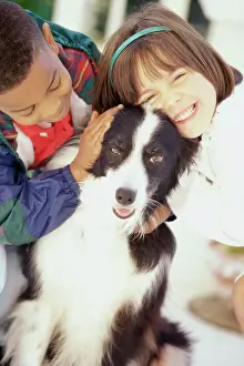 Hairband Prints: Portrait of a girl and a boy petting a dog
